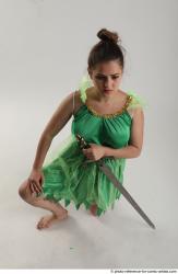 KATERINA KNNELING POSE WITH SWORD